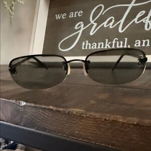 CHANEL Black Oval Sunglasses